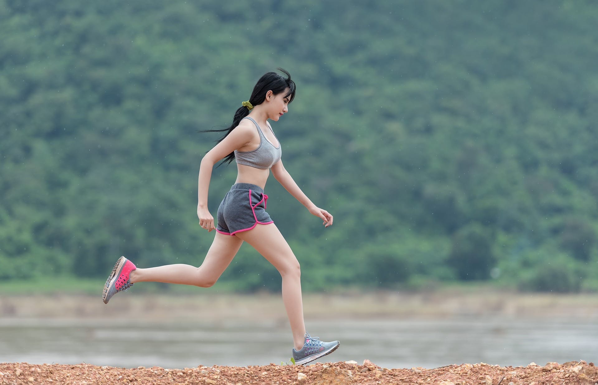 A young woman jogging.